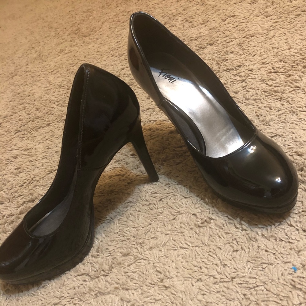 Black platform pumps